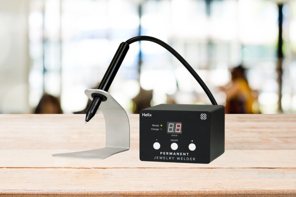 Helix welder featured on a table