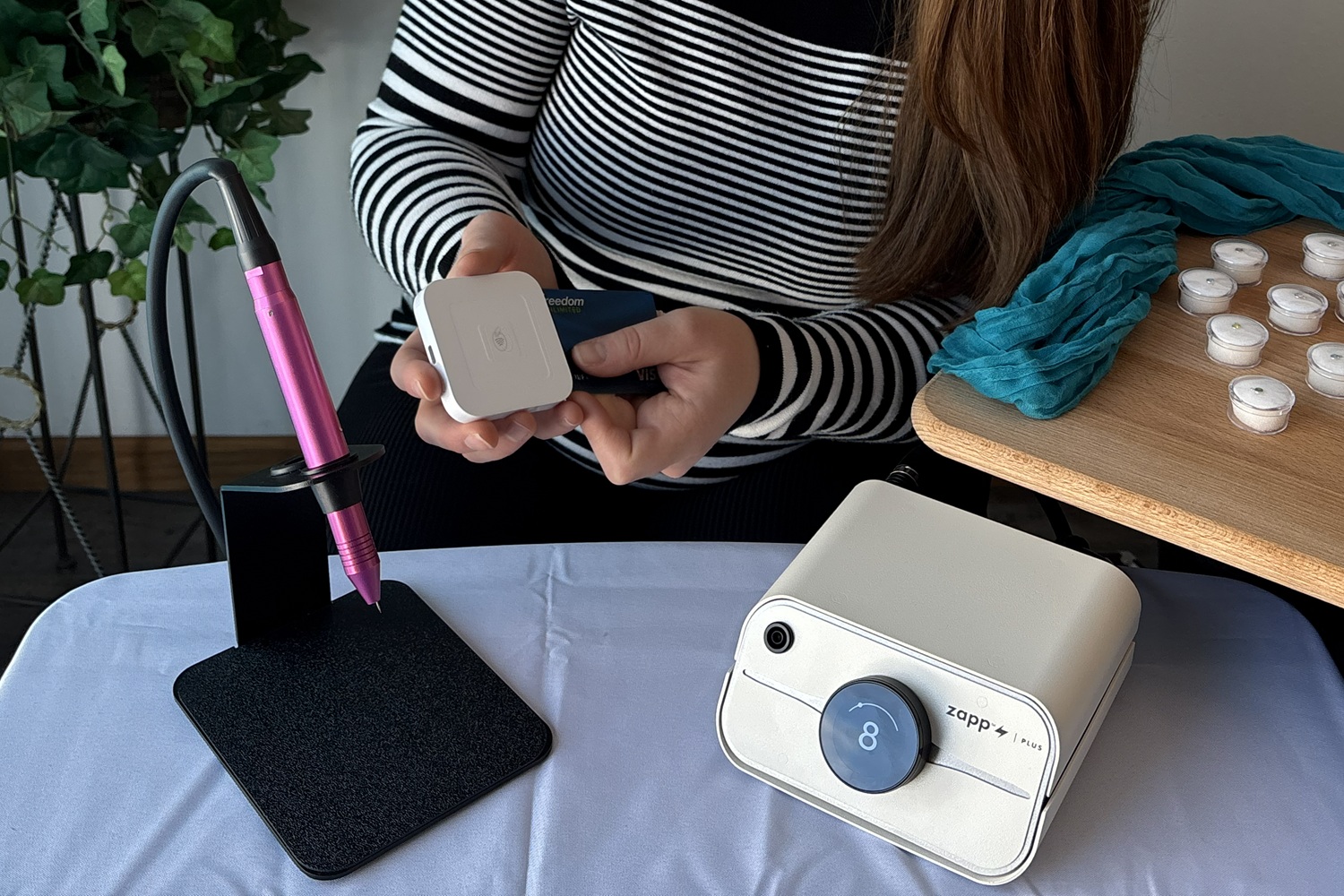 closeup of taking payment with a Square card reader