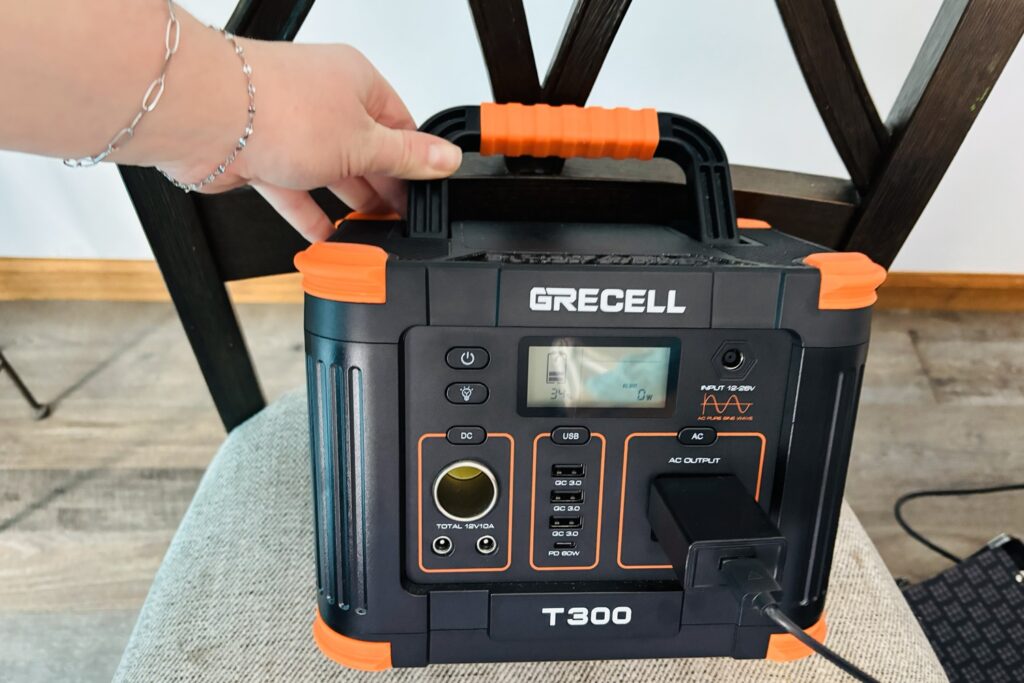 Grecell T300 power station on a chair