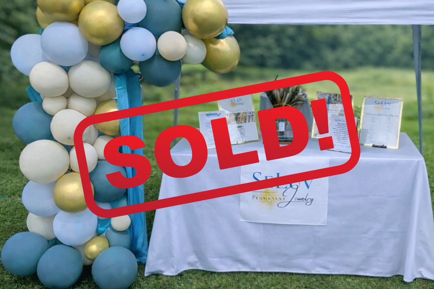 permanent jewelry business with sold sign